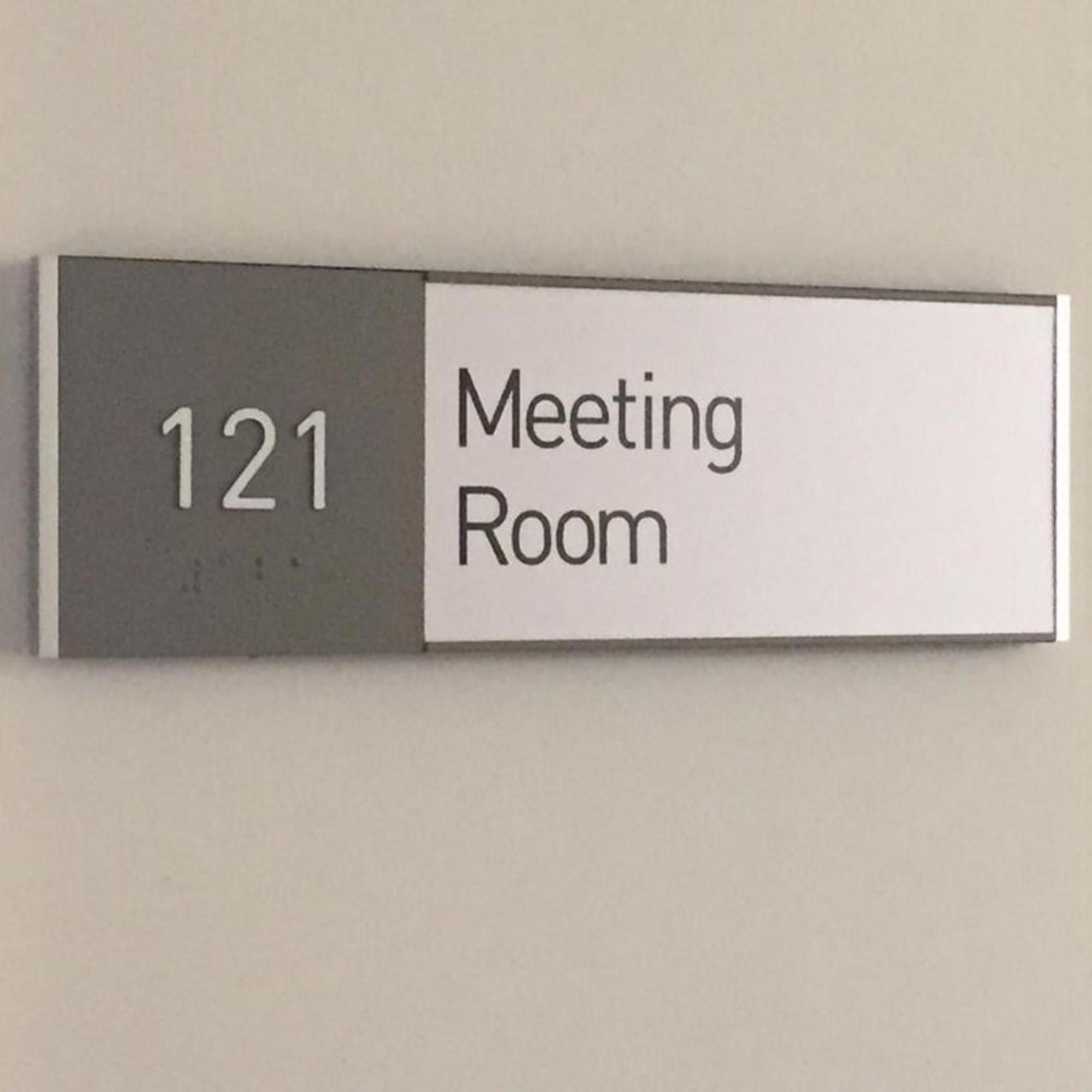 Interior signgae ADA sign raised letters wayfinding office building sign wall conference room sign braille signage