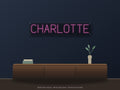 Charlotte City Name Neon Sign shown above a walnut console in a styled room mockup