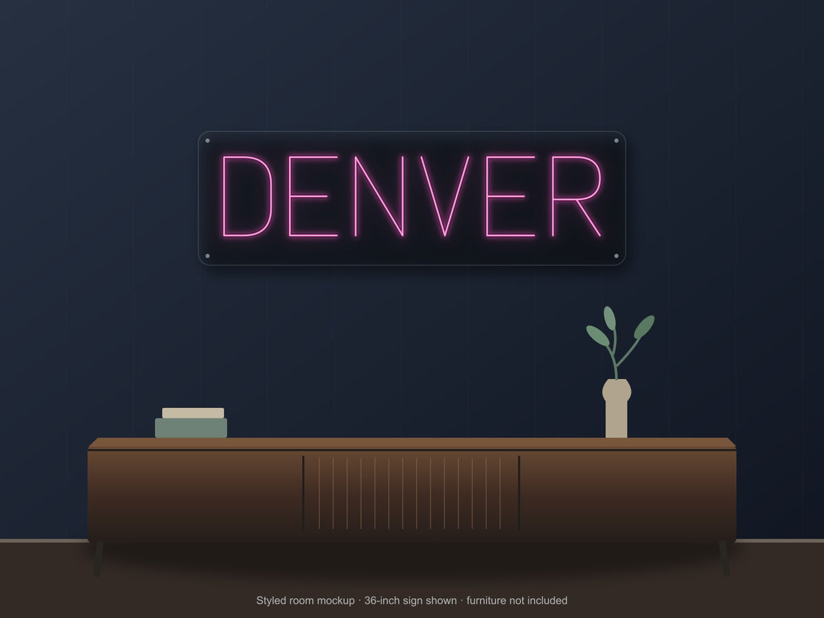 Denver City Name Neon Sign shown above a walnut console in a styled room mockup