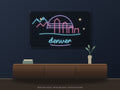 Denver Skyline Neon Sign shown above a walnut console in a styled room mockup