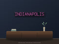 Indianapolis City Name Neon Sign shown above a walnut console in a styled room mockup