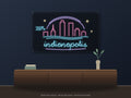 Indianapolis Skyline Neon Sign shown above a walnut console in a styled room mockup