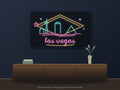 Las Vegas Skyline Neon Sign shown above a walnut console in a styled room mockup