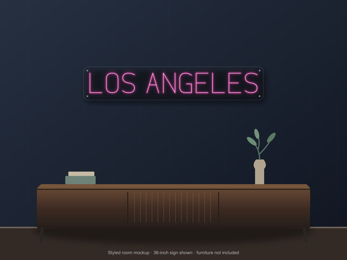 Los Angeles City Name Neon Sign shown above a walnut console in a styled room mockup
