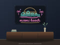 Miami Beach Skyline Neon Sign shown above a walnut console in a styled room mockup