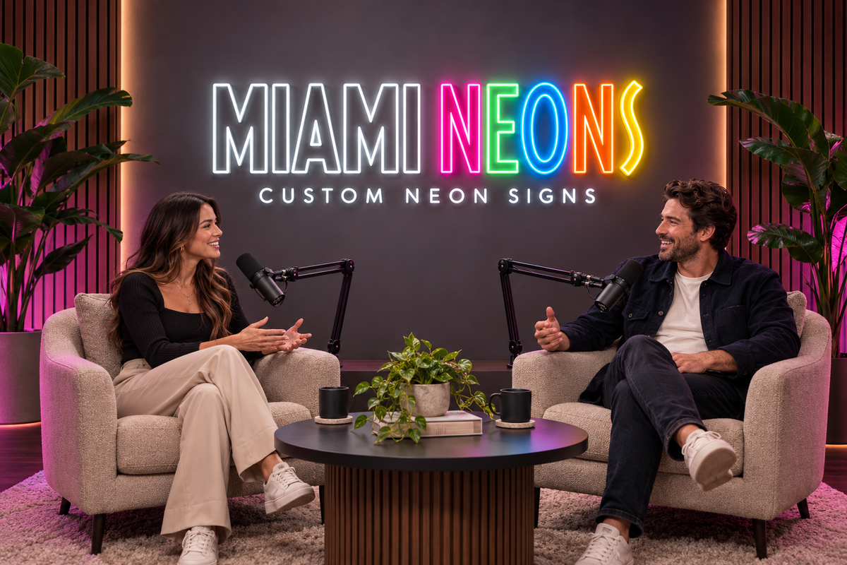 AI studio concept with two podcast hosts and a custom Miami Neons LED neon logo