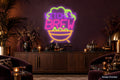 Witches’ Brew After Dark LED neon sign in plum, pink, lime and amber above a home cocktail bar - Design Preview