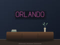 Orlando City Name Neon Sign shown above a walnut console in a styled room mockup