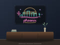 Phoenix Skyline Neon Sign shown above a walnut console in a styled room mockup