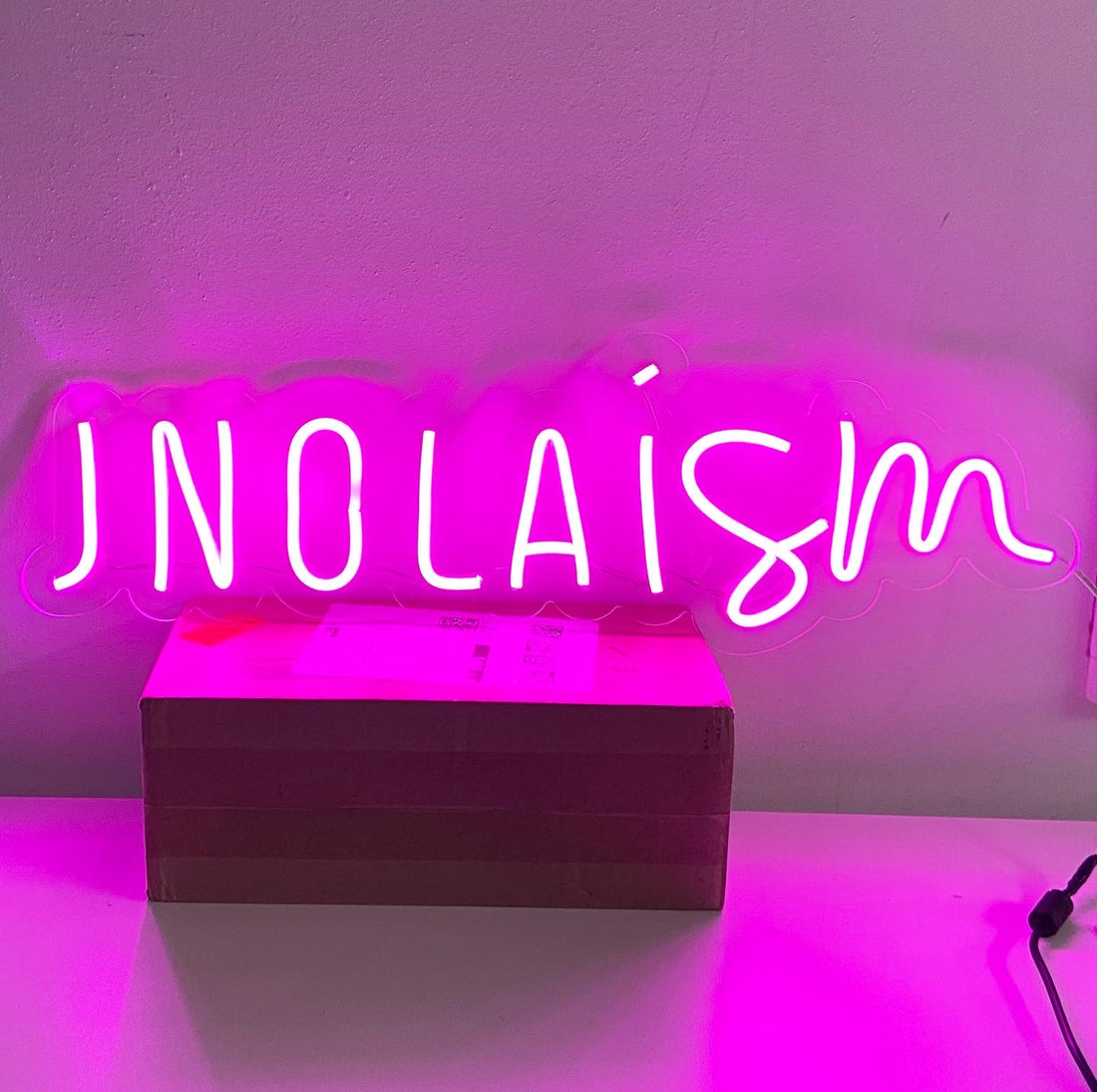 Custom LED neon logo example. Your sign is made with your podcast name or artwork.