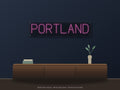 Portland City Name Neon Sign shown above a walnut console in a styled room mockup