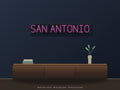 San Antonio City Name Neon Sign shown above a walnut console in a styled room mockup