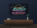 San Francisco Skyline Neon Sign shown above a walnut console in a styled room mockup