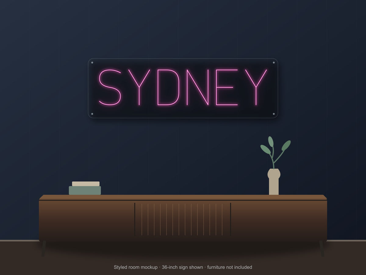 Sydney City Name Neon Sign shown above a walnut console in a styled room mockup