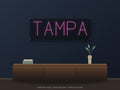 Tampa City Name Neon Sign shown above a walnut console in a styled room mockup